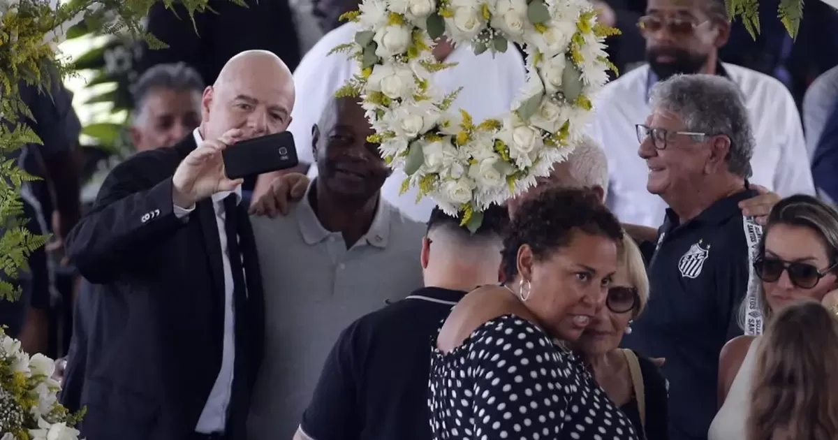 FIFA President responds to criticism for selfie at Pelé's funeral.