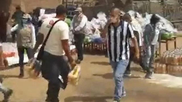 Hinchas de Universitario y Alianza Lima llevaron ayuda social. | Video: Facebook Trinchera Norte