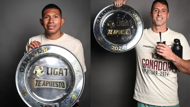 Edison Flores y Sebastián Britos posan orgullosos con el trofeo del Apertura / Foto: Universitario