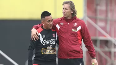 Christian Cueva y Ricardo Gareca. Foto: AFP